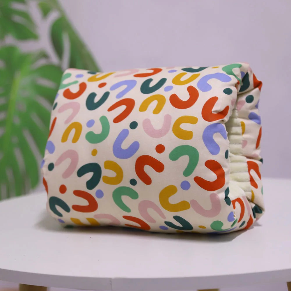 Nursing arm pillow in a colourful print