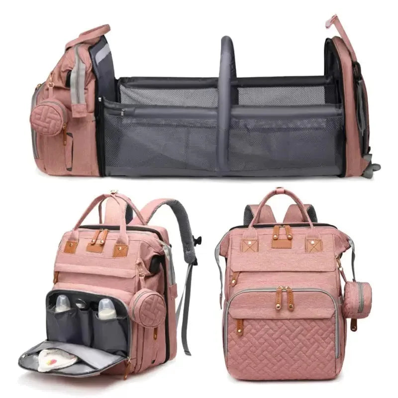 Diaper bag backpack in pink, folded out and closed