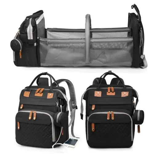 Diaper bag backpack in black, folded out and closed